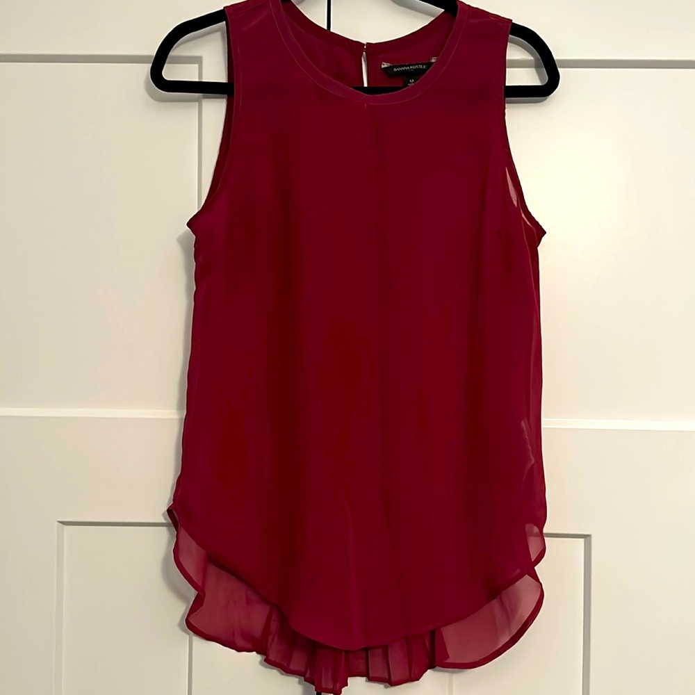 Pink sheer sleeveless top with pleated back